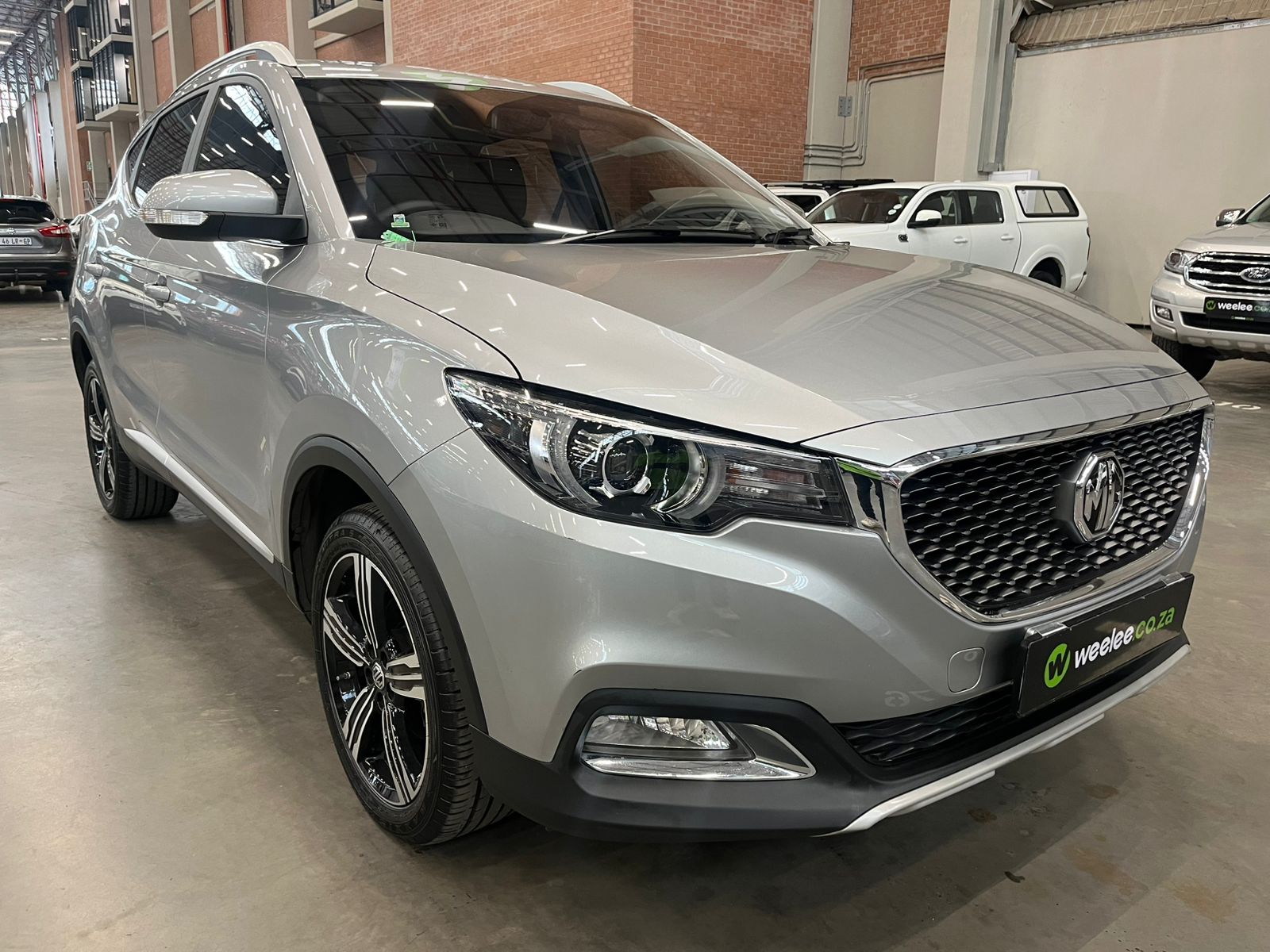 2025 MG ZS 1.5 Delux Auto Q2FyTGlzdGluZzo1OTI4NjY R259900 | Avo Auto